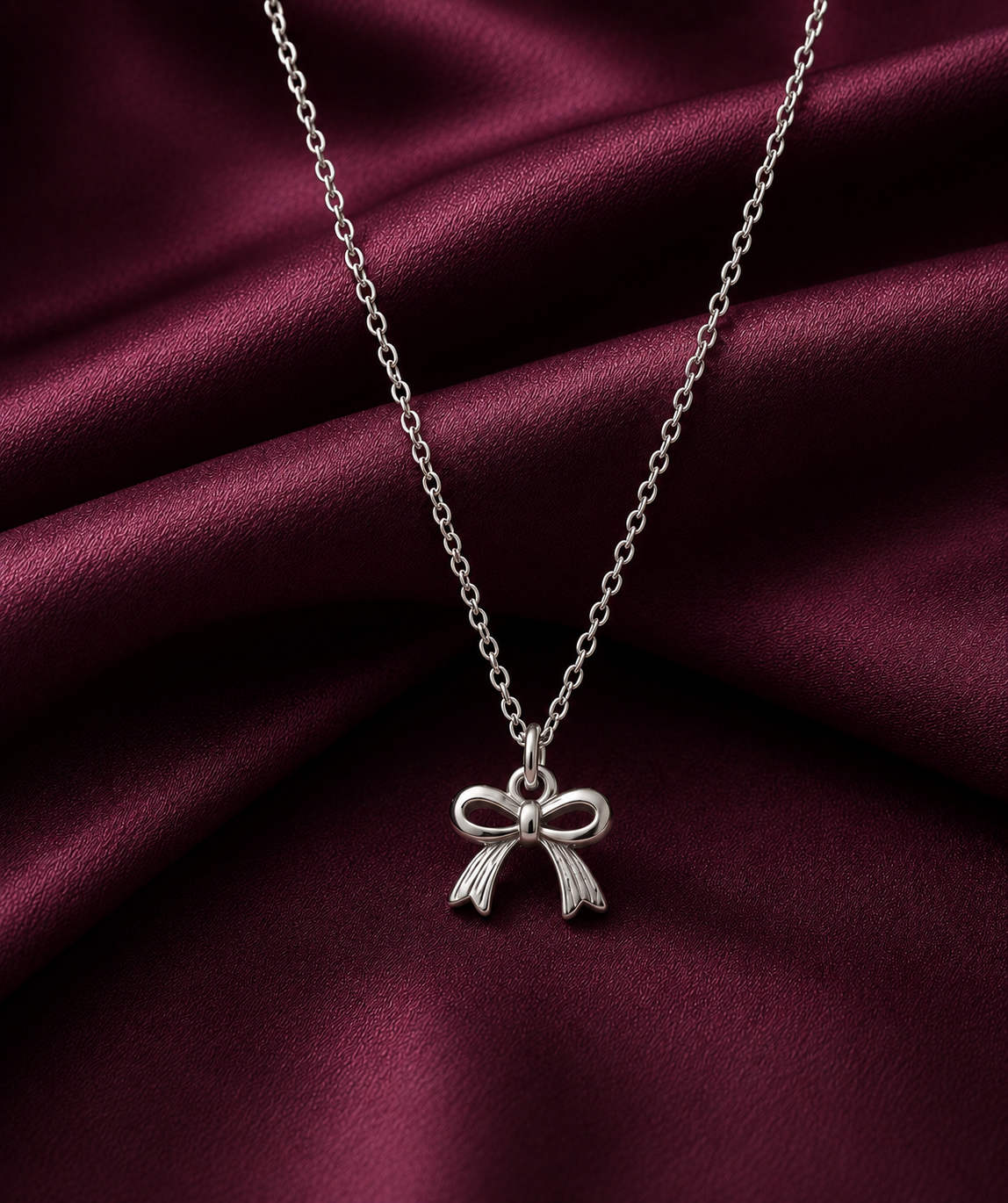 Silver Bow Pendant Necklace